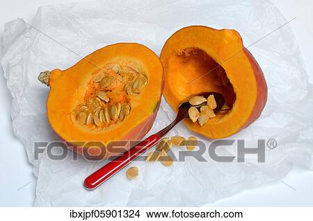 Pumpkin, pumpkin halves and pumpkin seeds with spoon, Germany, Europe View Large Photo Image Picture - Pumpkin, pumpkin halves and pumpkin seeds with spoon, Germany, Europe. Fotosearch