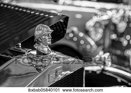 Stock Image - Radiator mascot from Oldtimer Excelsior Albert 1 Cabriolet, in black and white. Fotosearch