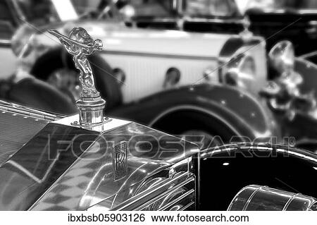 Radiator mascot Spirit of Ecstasy or Emily from oldtimer Rolls-Royce, in black and white View Large Photo Image Stock Photograph - Radiator mascot Spirit of Ecstasy or Emily from oldtimer Rolls-Royce, in black and white. Fotosearch