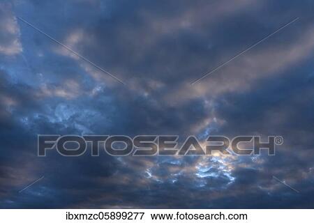 Stock Photo - Rain clouds (Nimbostratus), Bavaria, Germany, Europe. Fotosearch