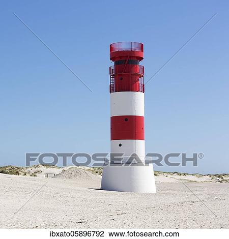 Red-white lighthouse Helgoland Dune on the south beach, Helgoland Dune, Helgoland Island, North Sea, Schleswig-Holstein, Germany, Europe View Large Photo Image Stock Image - Red-white lighthouse Helgoland Dune on the south beach, Helgoland Dune, Helgoland Island, North Sea, Schleswig-Holstein, Germany, Europe. Fotosearch