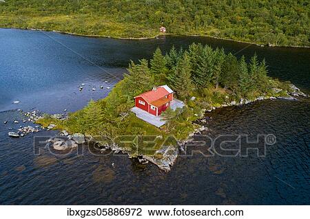 Red wooden cabin on a small island in a lake, Vestvågøy, Nordland, Lofoten, Norway, Europe View Large Photo Image Stock Image - Red wooden cabin on a small island in a lake, Vestvågøy, Nordland, Lofoten, Norway, Europe. Fotosearch