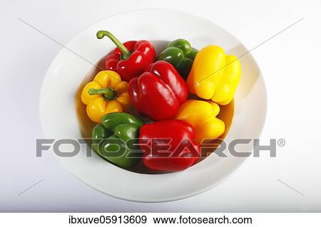 Stock Photo - Red, yellow and green peppers (Capsicum annuum), vegetables, studio recording, Germany, Europe. Fotosearch