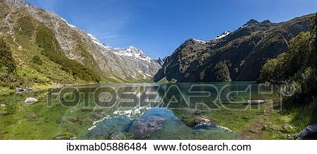 Reflection in Lake Marian, Fiordland National Park, Te Anau, Southland, South Island, New Zealand, Oceania View Large Photo Image Picture - Reflection in Lake Marian, Fiordland National Park, Te Anau, Southland, South Island, New Zealand, Oceania. Fotosearch