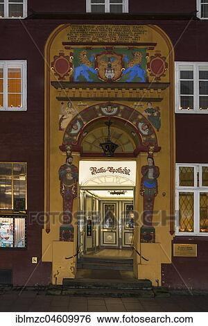Stock Photograph - Renaissance-Portal of the Alte Raths-Apotheke in the evening light, Lüneburg, Lower Saxony, Germany, Europe. Fotosearch