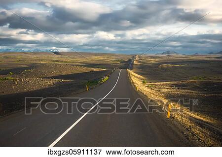 Road in the evening light runs through vuclan plateau with lava rock in the Krafla, Mývatn region, Skútustaðir, Norðurland eystra, Iceland, Europe View Large Photo Image Stock Photo - Road in the evening light runs through vuclan plateau with lava rock in the Krafla, Mývatn region, Skútustaðir, Norðurland eystra, Iceland, Europe. Fotosearch