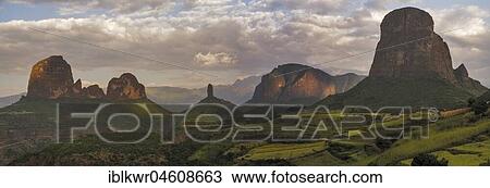 Stock Image - Rock formations and fields at the edge of Simien Mountains national park, Ethiopia, Africa. Fotosearch