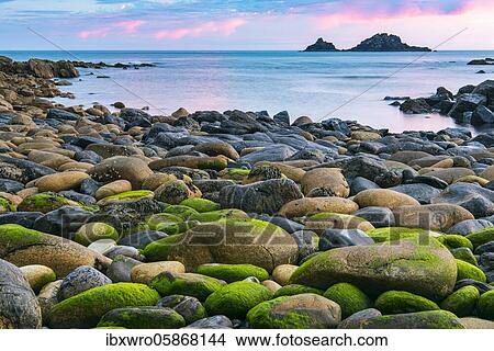 Rocky coast with round stones at Cape Cornwall, St Just, Penwith, Cornwall, England, Great Britain View Large Photo Image Picture - Rocky coast with round stones at Cape Cornwall, St Just, Penwith, Cornwall, England, Great Britain. Fotosearch
