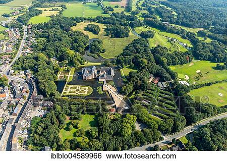 Stock Photograph - Romantik Parkhotel moated castle Anholt, Museum moated castle Anholt, with baroque garden, Wasserschloss Anholt, Isselburg, North Rhine-Westphalia, Germany, Europe. Fotosearch