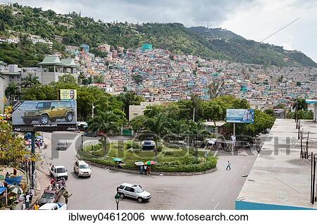 Stock Photograph - Roundabout, behind this slum Jalousie, Pétionville, Port-au-Prince, Ouest, Haiti, Central America. Fotosearch
