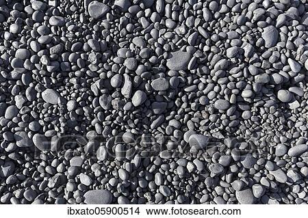Picture - Rounded black stones, lava pebbles, background image, beach Djúpalónssandur, Djupalonssandur, Hellnar, Snæfellsnes peninsula, Snaefellsnes, Vesturland, Iceland, Europe. Fotosearch