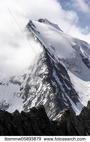 Rugged mountain peaks, Großer Möseler with Furtschaglkees glacier, snow-covered mountains, high alpine landscape in fog, Berliner Höhenweg, Zillertal Alps, Zillertal, Tyrol, Austria, Europe View Large Photo Image Stock Photo - Rugged mountain peaks, Großer Möseler with Furtschaglkees glacier, snow-covered mountains, high alpine landscape in fog, Berliner Höhenweg, Zillertal Alps, Zillertal, Tyrol, Austria, Europe. Fotosearch