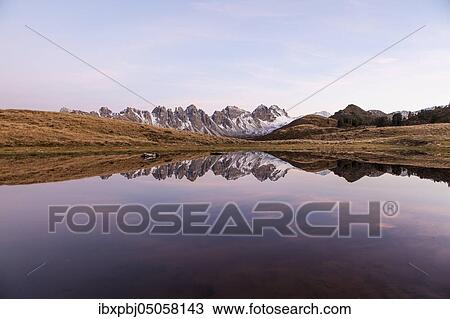 Stock Image - Salfeinersee, Reflection of the Kalkkögel, Tyrol, Austria, Europe. Fotosearch