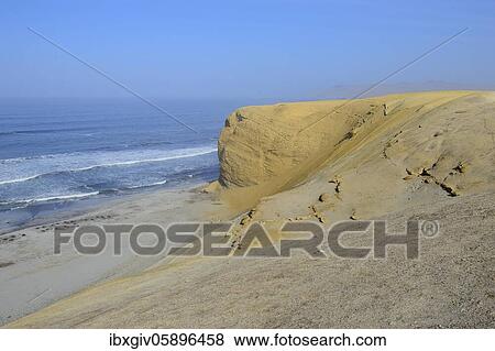 Stock Photo - Sandstone cliffs at Supay Beach, Paracas National Reserve, Paracas, Ica Region, Peru, South America. Fotosearch
