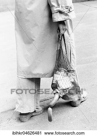 Stock Image - Sausages hanging from bag, ca. 1980s, East Berlin, GDR, Germany, Europe. Fotosearch