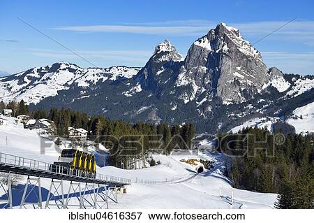 Stock Photo - Schwyz-Stoos cable car, steepest funicular in the world, rear of large and small myths, Stoos, canton Schwyz, Switzerland, Europe. Fotosearch