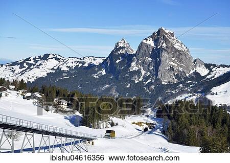 Stock Photograph - Schwyz-Stoos cable car, steepest funicular in the world, rear of large and small myths, Stoos, canton Schwyz, Switzerland, Europe. Fotosearch