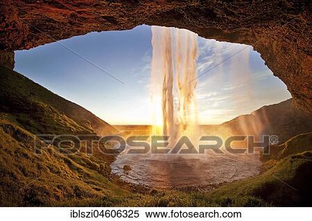 Seljalandsfoss waterfall in the back light, Seljalandsa river, South Island, Island View Large Photo Image Stock Photography - Seljalandsfoss waterfall in the back light, Seljalandsa river, South Island, Island. Fotosearch