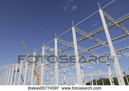 Shell of a logistics hall, concrete pillars and roof construction, Duisburg, North Rhine-Westphalia, Germany, Europe View Large Photo Image Stock Photo - Shell of a logistics hall, concrete pillars and roof construction, Duisburg, North Rhine-Westphalia, Germany, Europe. Fotosearch