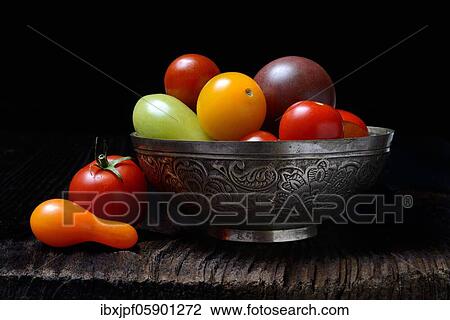 Shifted cherry tomatoes in peel, Germany, Europe View Large Photo Image Stock Image - Shifted cherry tomatoes in peel, Germany, Europe. Fotosearch