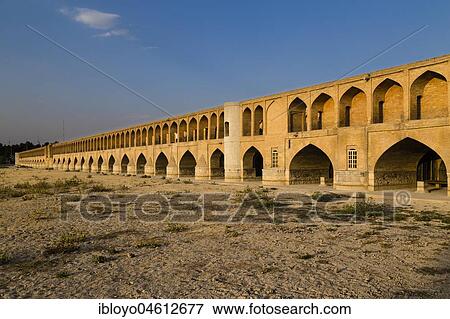 Si-o-Seh Pol or Si-o-Seh Bridge on the dried Zayandeh River, Esfahan, Iran, Asia View Large Photo Image Stock Photo - Si-o-Seh Pol or Si-o-Seh Bridge on the dried Zayandeh River, Esfahan, Iran, Asia. Fotosearch