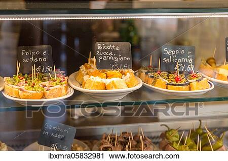 Small sandwiches snacks Cicchetti in wine bar Cantine del Vino gia Schiavi, Bridge San Trovaso, Dorsoduoro, Venice, Italy, Europe View Large Photo Image Stock Image - Small sandwiches snacks Cicchetti in wine bar Cantine del Vino gia Schiavi, Bridge San Trovaso, Dorsoduoro, Venice, Italy, Europe. Fotosearch