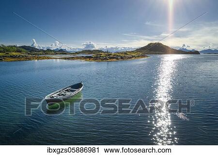 Small wooden boat between skerries in the sea, Lødingen, Nordland, Lofoten, Norway, Europe View Large Photo Image Stock Image - Small wooden boat between skerries in the sea, Lødingen, Nordland, Lofoten, Norway, Europe. Fotosearch