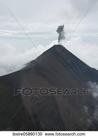 Smoke spitting volcano, Volcan de Fuego, Guatemala, Central America View Large Photo Image Stock Image - Smoke spitting volcano, Volcan de Fuego, Guatemala, Central America. Fotosearch