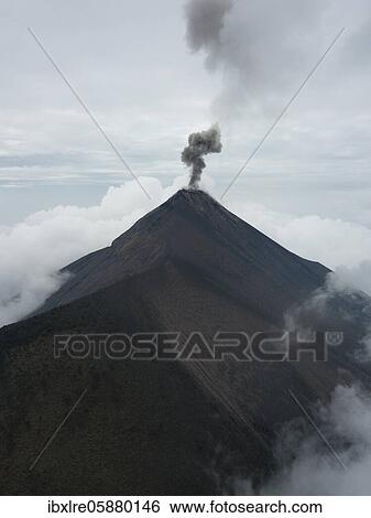 Smoke spitting volcano, Volcan de Fuego, Guatemala, Central America View Large Photo Image Stock Photograph - Smoke spitting volcano, Volcan de Fuego, Guatemala, Central America. Fotosearch