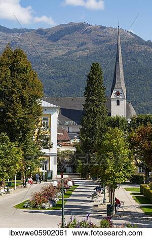 Stock Image - Spa gardens with the parish church of St. Nicholas, Bad Ischl, Salzkammergut, Upper Austria, Austria, Europe. Fotosearch