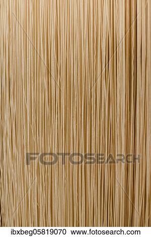 Stock Image - Spaghetti, noodle production. Fotosearch