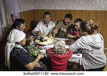 Spai Bashakhan, head of a nomadic family in the Altai mountains, dinner together in the winter quarters, Olgii province, Mongolia, Asia View Large Photo Image Stock Image - Spai Bashakhan, head of a nomadic family in the Altai mountains, dinner together in the winter quarters, Olgii province, Mongolia, Asia. Fotosearch