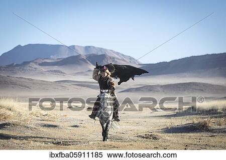 Spai Bashakhan's son during training for the Mongolian equestrian game Buzkaschi, Olgii Province, Mongolia, Asia View Large Photo Image Stock Photography - Spai Bashakhan's son during training for the Mongolian equestrian game Buzkaschi, Olgii Province, Mongolia, Asia. Fotosearch