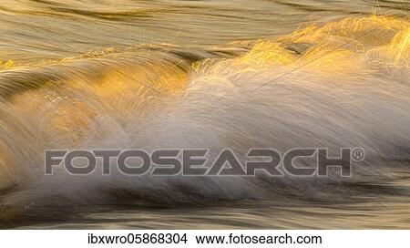 Spray, waves on the beach, sunset, long exposure, dynamic range, Porth Nanven, St. Just, Cornwall, Great Britain View Large Photo Image Picture - Spray, waves on the beach, sunset, long exposure, dynamic range, Porth Nanven, St. Just, Cornwall, Great Britain. Fotosearch