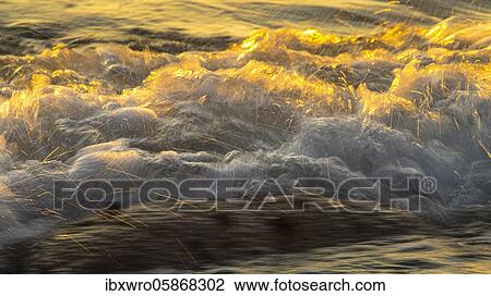 Spray, waves on the beach, sunset, long exposure, dynamic range, Porth Nanven, St. Just, Cornwall, Great Britain View Large Photo Image Stock Image - Spray, waves on the beach, sunset, long exposure, dynamic range, Porth Nanven, St. Just, Cornwall, Great Britain. Fotosearch