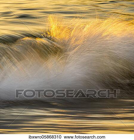 Spray, waves on the beach, sunset, long exposure, dynamic range, Porth Nanven, St. Just, Cornwall, Great Britain View Large Photo Image Stock Image - Spray, waves on the beach, sunset, long exposure, dynamic range, Porth Nanven, St. Just, Cornwall, Great Britain. Fotosearch