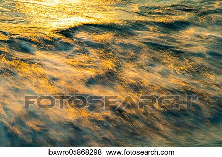 Spray, waves on the beach, sunset, long exposure, dynamic range, Porth Nanven, St. Just, Cornwall, Great Britain View Large Photo Image Stock Photo - Spray, waves on the beach, sunset, long exposure, dynamic range, Porth Nanven, St. Just, Cornwall, Great Britain. Fotosearch