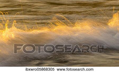 Spray, waves on the beach, sunset, long exposure, dynamic range, Porth Nanven, St. Just, Cornwall, Great Britain View Large Photo Image Stock Photography - Spray, waves on the beach, sunset, long exposure, dynamic range, Porth Nanven, St. Just, Cornwall, Great Britain. Fotosearch
