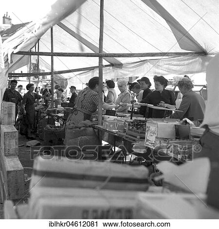 Stock Image - Stands under a tarpaulin, Freiburger Münstermarkt, approx. 1945 to 1955, Freiburg, Germany, Europe. Fotosearch