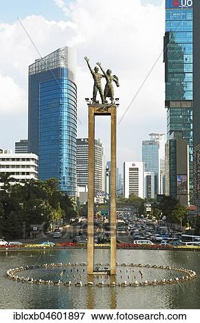Stock Photo - Statue of Independence, Thamrin roundabout, Jakarta, Java, Indonesia, Asia. Fotosearch