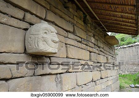 Stone head, half man half cat, on a wall of the ruins of Chavín de Huántar, Unesco World Heritage Site, near Huaraz, Ancash region, Peru, South America View Large Photo Image Stock Photo - Stone head, half man half cat, on a wall of the ruins of Chavín de Huántar, Unesco World Heritage Site, near Huaraz, Ancash region, Peru, South America. Fotosearch