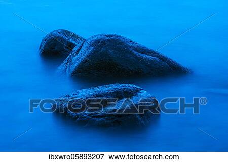 Stones in the water of the Baltic Sea, long time exposure, coast near Lohme, Rügen, National Park Jasmund, Mecklenburg-Vorpommern, Germany, Europe View Large Photo Image Stock Photo - Stones in the water of the Baltic Sea, long time exposure, coast near Lohme, Rügen, National Park Jasmund, Mecklenburg-Vorpommern, Germany, Europe. Fotosearch