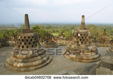 Stupas, Buddhist temple complex Borobudur, Yogyakarta, Java, Indonesia, Asia View Large Photo Image Stock Photo - Stupas, Buddhist temple complex Borobudur, Yogyakarta, Java, Indonesia, Asia. Fotosearch