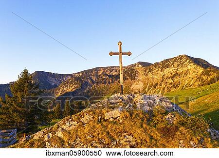 Stock Image - Summit cross at Sudelfeldkopf, Stellnerjoch and Kleiner Traithen in the morning light, Sudelfeld, near Bayrischzell, Mangfall mountains, drone photograph, Upper Bavaria, Bavaria, Germany, Europe. Fotosearch