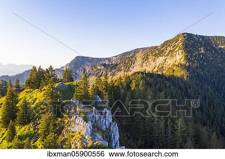 Stock Photograph - Summit cross at the mountain Vogelsang, on the right Kleiner Traithen, at the Sudelfeld near Bayrischzell, Mangfall mountains, drone picture, Upper Bavaria, Bavaria, Germany, Europe. Fotosearch
