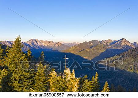 Summit cross on the mountain Vogelsang at Sudelfeld near Bayrischzell, Mangfall mountains, drone photograph, Upper Bavaria, Bavaria, Germany, Europe View Large Photo Image Stock Photo - Summit cross on the mountain Vogelsang at Sudelfeld near Bayrischzell, Mangfall mountains, drone photograph, Upper Bavaria, Bavaria, Germany, Europe. Fotosearch