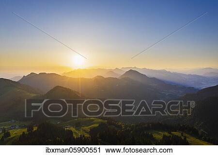 Stock Image - Sunrise at Sudelfeld, near Bayrischzell, Mangfall mountains, drone picture, Upper Bavaria, Bavaria, Germany, Europe. Fotosearch