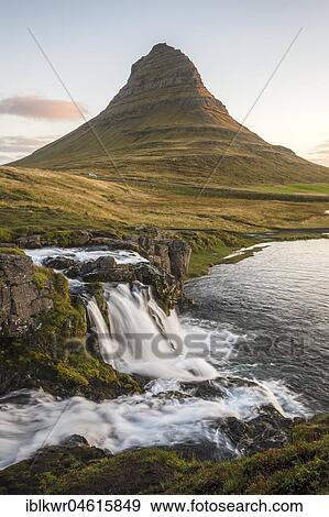 Stock Photo - Sunrise on Kirkjufell mountain with waterfall Kirkjufellfoss, Grundafjördur, West Iceland, Iceland, Europe. Fotosearch