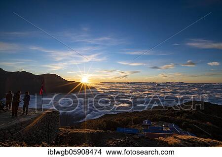 Sunrise over cloud cover in the high camp of Machapuchare, Himalaya, fish tail, Mardi Himal, Annapurna region, Nepal, Asia View Large Photo Image Picture - Sunrise over cloud cover in the high camp of Machapuchare, Himalaya, fish tail, Mardi Himal, Annapurna region, Nepal, Asia. Fotosearch