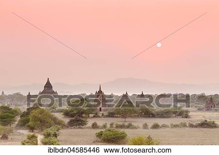 Stock Photograph - Sunrise, pagodas, temples, stupas, Bagan, Mandalay Division, Myanmar, Asia. Fotosearch